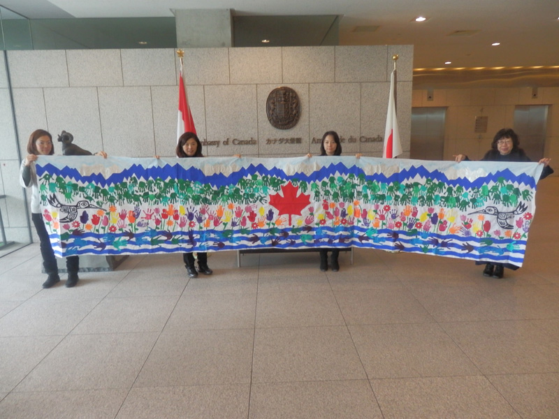 Embassy of Canada: The cotton sheeting painted by the children of Canada has come back to us.