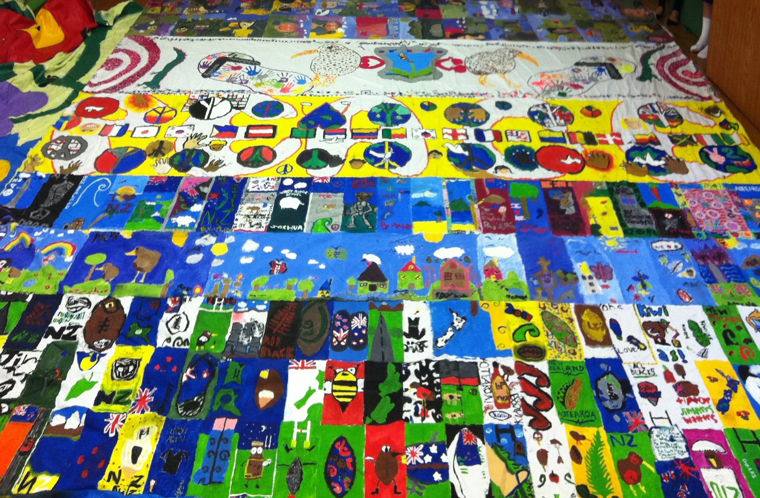 The cotton sheeting painted by the children of New Zealand has come back to us.